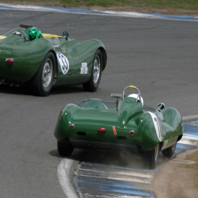 Here you see Dion Kremer squeezing past Martin Stretton’s 3.8L Lister Jaguar